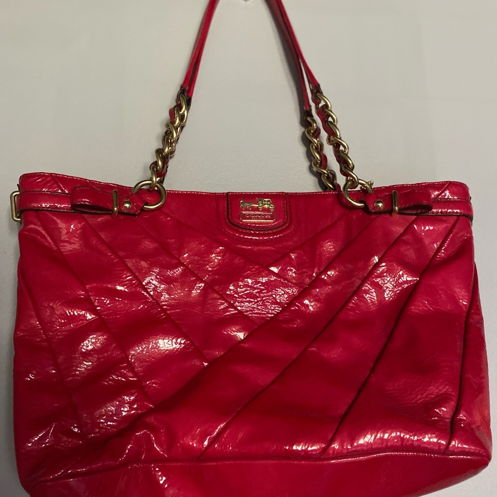 As is like new coach red patent leather bag